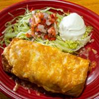 Chimichanga · Chimichanga burrito deep fried until golden brown then finished in the oven with cheese on t...