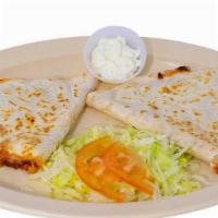 Quesadilla · Choice of beef, chicken, cheese, or beans.