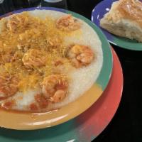 Shrimp & Grits · Southern creamy grits topped with Creole shrimp served with your choice of Texas toast, butt...