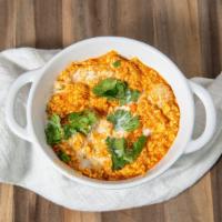 Paneer Bhurji · Scrambled indian cottage cheese with onion, tomatoes, and spices.