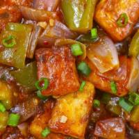 Chilli Paneer · cubes of fried crispy paneer are tossed in a spicy sauce made with soy sauce, vinegar, chili...