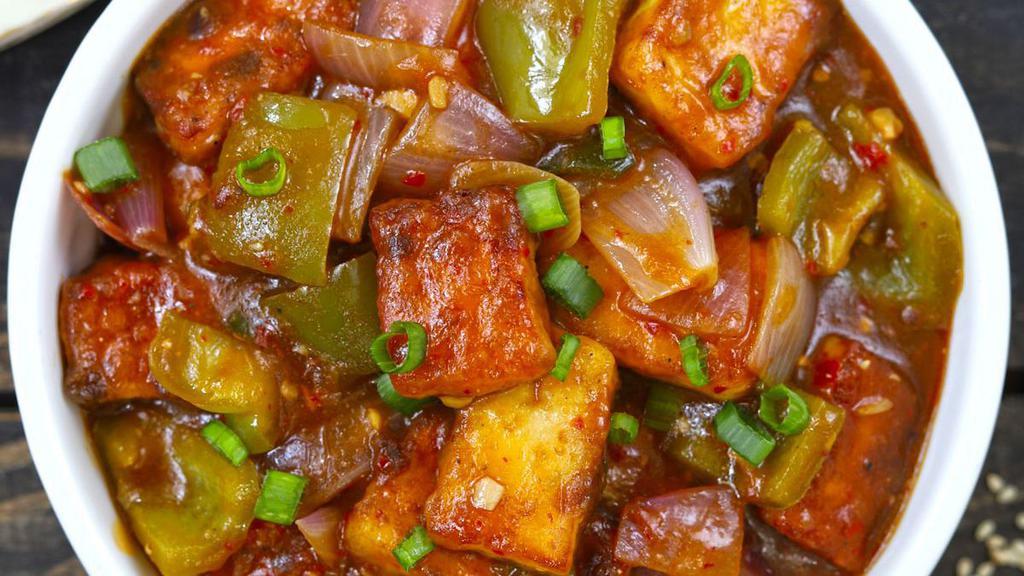 Chilli Paneer · cubes of fried crispy paneer are tossed in a spicy sauce made with soy sauce, vinegar, chili sauce.