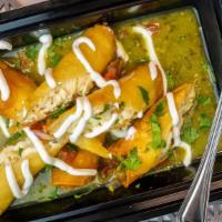 Flautas · Three flautas stuffed with shredded chicken and Monterrey Jack cheese, served with pico de g...