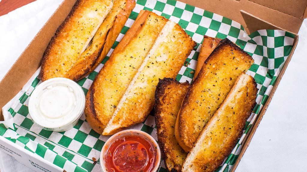 Garlic Bread Sticks · Served with ranch dressing or pizza sauce.