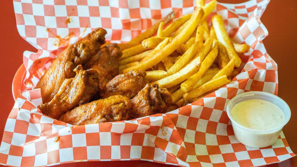Hot Wings · 7 Wings tossed in our Authentic Hot sauce served with seasoned fries and a ranch dipping sauce.