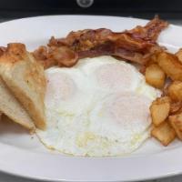 Eggs Any Style · 3 eggs home fries and toast