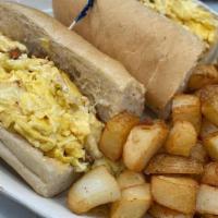 Harry'S Favorite Sandwich · Our fresh torpedo roll stuffed with an abundance of eggs, scrambled with . Italian sausage a...