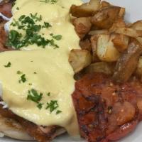 Meeting Street Benedict · Virginia baked ham, poached eggs and house-made hollandaise served . on english muffin with ...