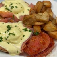 Lox Benedict · Nova Lox, poached eggs and hollandaise served on english  muffin. with home fries and grille...
