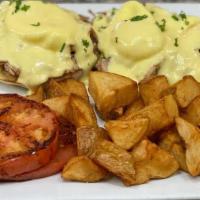 Pulled Pork Benedict · PULLED PORK, POACHED EGGS AND HOLLANDAISE SAUCE SERVED ON ENGLISH MUFFIN WITH HOME FRIES AND...