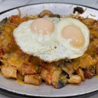 Breakfast Skillet · SERVED WITH SAUSAGE, TOMATO, PEPPERS ONION, MUSHROOMS, HOME FRIES, JACK CHEESE ANd 2 EGGS ON...