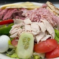 Chef'S Salad · A large garden salad topped with turkey, ham, . roast beef, Swiss, and hard-cooked egg.