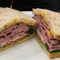 The New Yorker · DOUBLE PORTION OF CORNED BEEF OR PASTRAMI WARM ON RYE