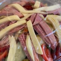 Large Antipasto · Spicy and baked ham, Genoa salami cornets, . provolone cheese, hot peppers, chick-peas, roas...