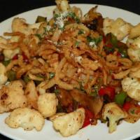 Cauliflower Calabrese · Grilled cauliflower, bell pepper, mushroom, onion and red pepper flakes topped with onion st...