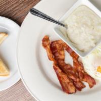 Classic American Breakfast · Your choice of applewood smoked bacon, sausage patty, Virginia smoked ham, turkey sausage wi...