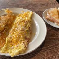 Meat & Cheese Omelette · Choice of ham, bacon, or sausage with Cheddar cheese.