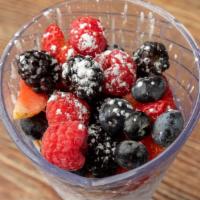 Fruit Rush Yogurt Parfait · Fresh mixed berries and yogurt between layers of granola.