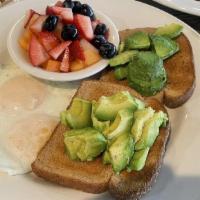 Avocado Toast · Fresh avocado served on your choice of white, wheat or sourdough. Served with two eggs and f...