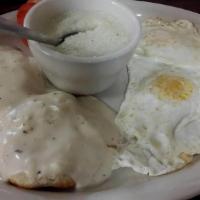 Eggs Petite With Biscuit & Country Gravy · Two eggs, grits or oatmeal with biscuit and country gravy.