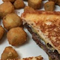 Patty Melt Deluxe · Juicy patty with grilled onion and melted cheese on grilled Texas toast.
