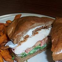 Grilled Chicken Club · Grilled chicken breast with swiss cheese and bacon, mayo, lettuce, tomato on toasted wheat b...