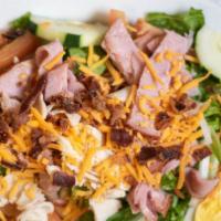 Chef Salad · Lettuce, egg, tomato, onion, cucumber, carrot, cheese, ham, turkey, and bacon and choice of ...