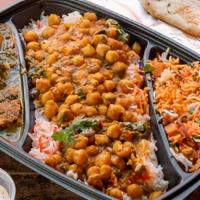 Chana Masala · Chickpeas with a blend of spices, onions, chilies and tomatoes.