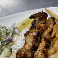 Chicken Souvlaki Platter · Grilled chicken souvlaki skewers marinated with XVOO, herbs and served with fries, tzatziki,...