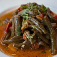 Stewed Green Beans · Traditional stewed green beans with tomato and herbs