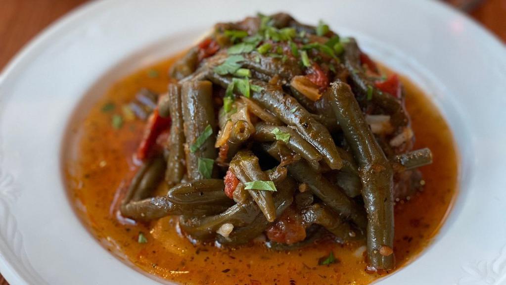 Stewed Green Beans · Traditional stewed green beans with tomato and herbs