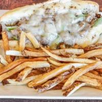 Steak Bomb Sub · Shaved ribeye steak, onions, mushrooms, peppers and provolone cheese.