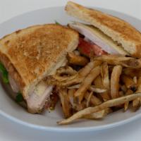 Turkey Sandwich · Our fresh roasted turkey, Swiss, mayo lettuce tomato and onion on your choice of bread serve...