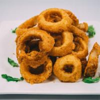 Onion Rings · House cut and freshly battered to order onion rings
