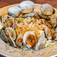 Pasta & Little Necks · Little neck clams cooked in a butter and white wine sauce with diced red onions, garlic and ...