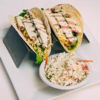 Seared Tuna Tacos · Two soft shell tacos filled with rare sesame encrusted tuna, Asian chili rice chopped greens...