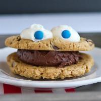 Cookie Monster · Scoop of vanilla or fudge frosting sandwiched between two chocolate chip cookies. Monster is...