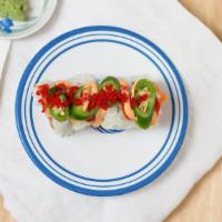 Fire Storm Roll (4 Pc) · Salmon (or tuna), cucumber, jalapeno, masago pickled with havanero and spicy sauce.