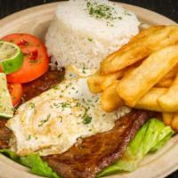 Bistek A Lo Pobre · Marinated steak, topped with an over easy egg, served with fries, plantains and rice.
