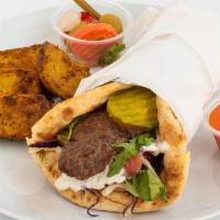 Beyond Kabob Wrap · Beyond kabob, salad, tahini, and pickles in a soft and warm pita. Served with a side of roas...