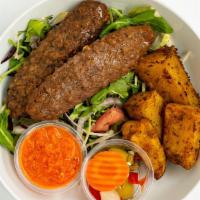 Beyond Kabob & Potato Basket · Two pieces of beyond kabob (vegan meat) served with a side of roasted potatoes and a dip or ...