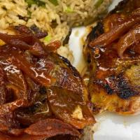 Pork Loin · Grilled pork loin topped with pickled onions served with house rice