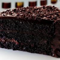 Old Fashioned Chocolate Cake · Alternating layers of rich fudgy cake and smooth chocolate butter cream, covered with chocol...