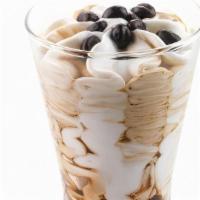 Coppa Gelato Caffe Glass · Fior di latte gelato with rich coffee and pure cocoa swirl
