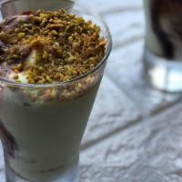 Coppa Pistachio Gelato Glass · Custard gelato swirled with chocolate and pistachio gelato topped with praline pistachios.