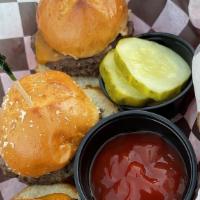 Cheeseburger Sliders · Angus beef burgers, cheddar and pickle.