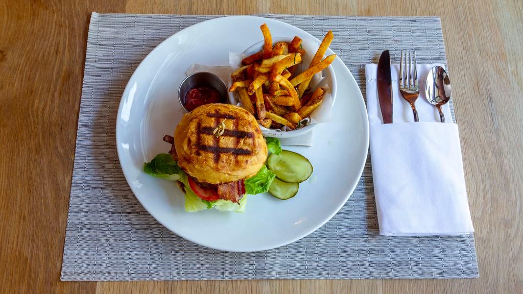 Ella'S Burger · Cheddar cheese, Bibb lettuce, tomato and bacon. Served on a house made bun