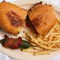 Milanesa Torta · Breaded meat, beans, mayo, avocado, tomato, red onion Mexican sandwich. Side of fries and fr...