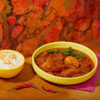 Lamb Vindaloo · Spicy lamb in a curry sauce.