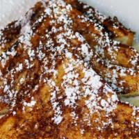French Toast · Made with white bread, syrup, egg, milk and cinnamon.